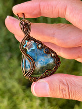 Load image into Gallery viewer, Artisan cab (positive rocks) Blue (dyed) Indonesian moss agate with pyrite + sapphire gem accents wire wrapped pendant necklace
