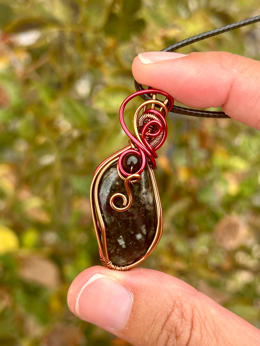 Eudialyte with obsidian gem accent wire wrapped pendant necklace