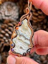 Load image into Gallery viewer, Artisan cab (positive rock) white crazy lace agate with chakra gem accents wire wrapped pendant necklace
