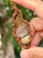 Load image into Gallery viewer, Artisan cab (positive rock) imperial jasper with tiger eye, carnelian, garnet gem accents wire wrapped pendant necklace
