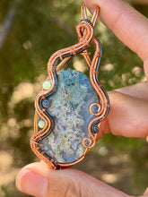 Load image into Gallery viewer, Artisan cab (positive rock) sky moss agate doublet with chrysopease + dumortierite gem accent wire wrapped pendant necklace
