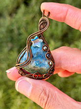 Load image into Gallery viewer, Artisan cab (positive rocks) Blue (dyed) Indonesian moss agate with pyrite + sapphire gem accents wire wrapped pendant necklace
