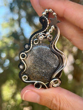 Load image into Gallery viewer, Black sunstone with hematite star, grey moonstone, onyx gem accents wire wrapped pendant necklace
