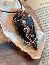 Load image into Gallery viewer, Reserved for Desiree k Obsidian arrowhead with turquoise + sapphire inclusions Wire wrapped pendant

