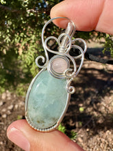 Load image into Gallery viewer, Reserved for Colleen t aquamarine with Rose quartz gem inclusion Wire Wrapped Pendent Necklace
