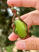 Load image into Gallery viewer, Green cat’s eye with green tourmaline gem accents wire wrapped pendant necklace
