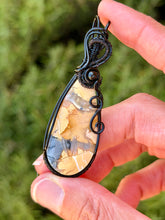 Load image into Gallery viewer, Artisan cab (positive rocks) yellow maligano jasper with onyx gem accent wire wrapped pendant necklace
