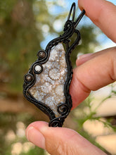 Load image into Gallery viewer, artisan cab (positive rock) black fossilized coral with obsidian + moonstone gem stone accents wire wrapped pendant necklace
