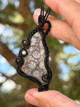 Load image into Gallery viewer, artisan cab (positive rock) black fossilized coral with obsidian + moonstone gem stone accents wire wrapped pendant necklace
