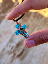 Load image into Gallery viewer, Blue (dyed) magnesite cross with black spinel  Wire wrapped pendant
