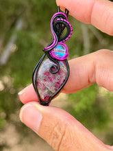 Load image into Gallery viewer, Ruby with angel aura quartz gem accent wire wrapped pendant necklace
