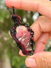 Load image into Gallery viewer, Artisan cab (johari gems) lava vein crazy lace agate with garnet + obsidian gem accents wire wrapped pendant necklace
