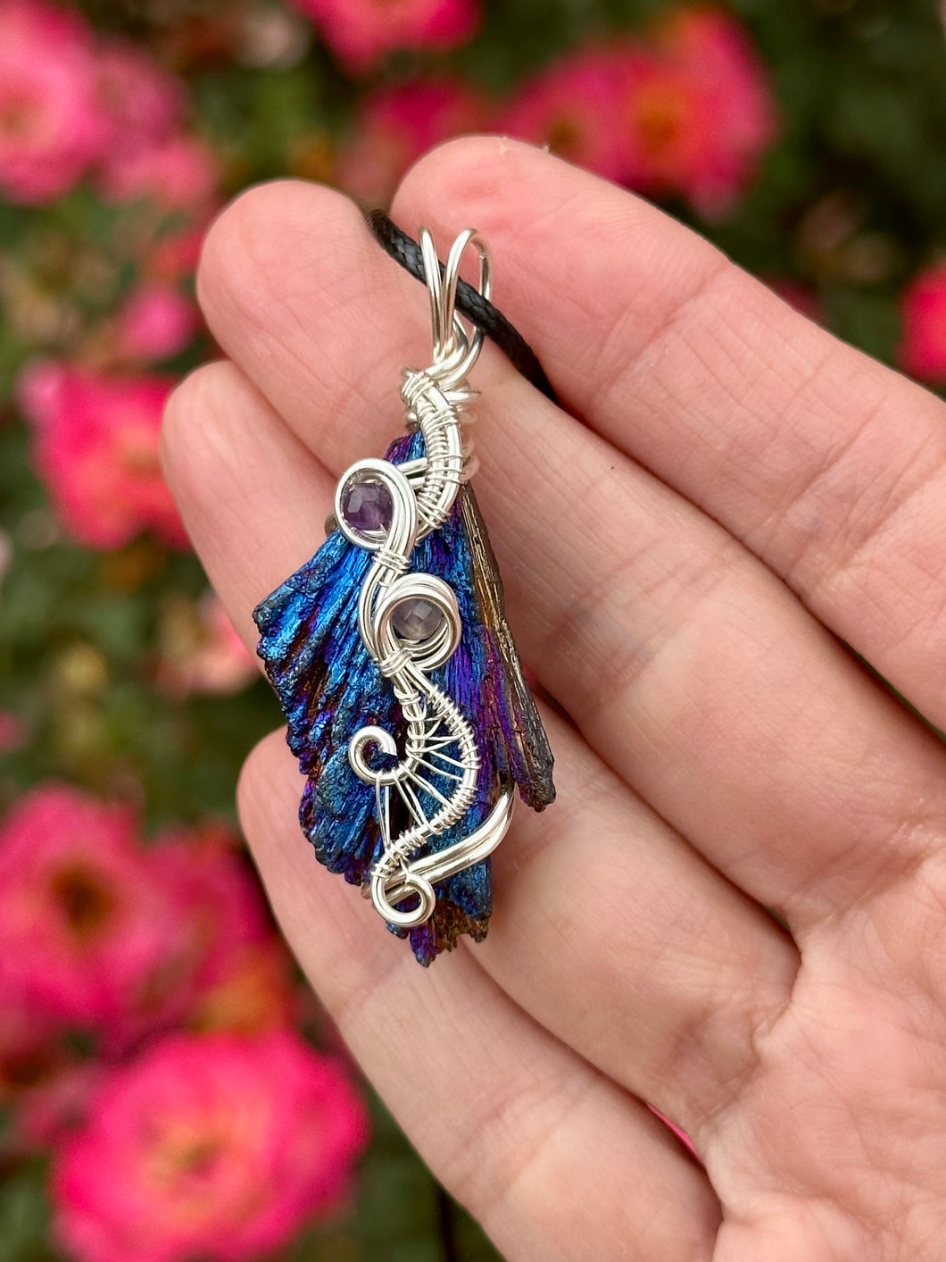 RESERVED FOR TAMMI g Titanium aura black kyanite with amethyst Wire wrapped pendant