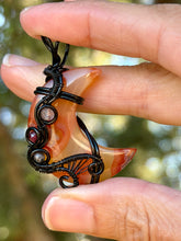 Load image into Gallery viewer, Artisan cab (positive rock) carnelian moon with rutile quartz + garnet gem accents wire wrapped pendant necklace
