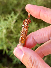 Load image into Gallery viewer, Bronze aura quartz with rhodonite gem accent mini wire wrapped pendant necklace
