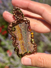 Load image into Gallery viewer, Artisan cab (positive rock) Scenic Plume Jasper with Garnet, Orange Garnet, Yellow Mookaite, Tiger Eye, Serpentine + Peridot Gem Accents wire wrapped pendant necklace
