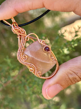 Load image into Gallery viewer, Faceted Peach moonstone with Ruby gem accent wire wrapped pendant necklace
