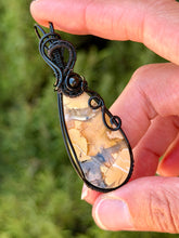 Load image into Gallery viewer, Artisan cab (positive rocks) yellow maligano jasper with onyx gem accent wire wrapped pendant necklace
