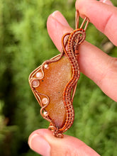 Load image into Gallery viewer, Artisan cab (positive rock) half polished carnelian with druzy with sunstone + rose quartz + copper  gem accents wire wrapped pendant necklace
