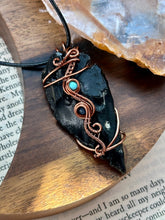 Load image into Gallery viewer, Reserved for Desiree k Obsidian arrowhead with turquoise + sapphire inclusions Wire wrapped pendant
