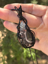 Load image into Gallery viewer, Artisan cab (johari gems) Lava vein Crazy lace agate with obsidian and garnet gem accents wire wrapped pendant necklace
