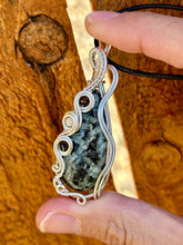 Load image into Gallery viewer, Chrysanthemum with garnet + moonstone inclusions   wire wrapped pendent
