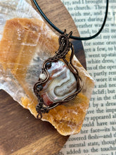 Load image into Gallery viewer, Reserved for Ann c DESIGNER STONE Mexican crazy lace agate with obsidian + citrine inclusions Wire wrapped pendant

