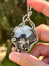 Load image into Gallery viewer, Artisan cab (positive rocks) black scenic maligano jasper with obsidian + labradorite gem accent wire wrapped pendant necklace
