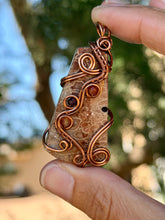 Load image into Gallery viewer, Artisan cab (positive rock) fossilized palm root with carnelian + garnet gem accents wire wrapped pendant necklace
