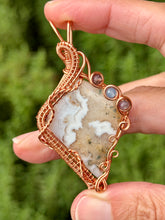 Load image into Gallery viewer, Artisan cab (positive rock) white plume agate with amethyst + aquamarine gem accents wire wrapped pendant necklace
