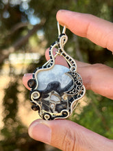 Load image into Gallery viewer, Artisan cab (positive rocks) black scenic maligano jasper with obsidian + labradorite gem accent wire wrapped pendant necklace
