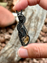 Load image into Gallery viewer, Fossilized palm root with black tourmaline mini wire wrapped pendant necklace
