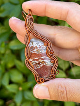 Load image into Gallery viewer, Artisan cab (positive rocks) red river jasper with goldstone + carnelian gem accents wire wrapped pendant necklace
