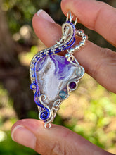 Load image into Gallery viewer, Artisan cab (positive rock) purple aurora opal plume agate doublet with amethyst, blue topaz  gem accents wire wrapped pendant necklace
