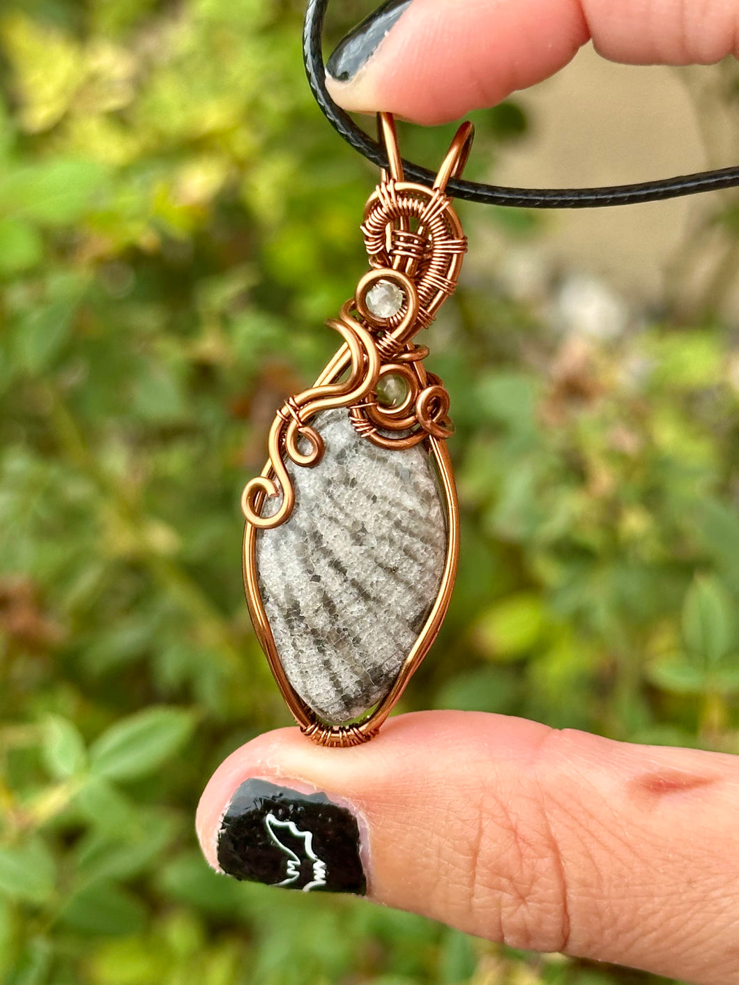 Fossilized black coral with green fluorite + peridot gem inclusions wire wrapped pendant necklace