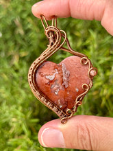 Load image into Gallery viewer, Artisan cab (positive rocks) carnelian heart with sunstone gem Accent wire wrapped pendant necklace
