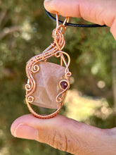 Load image into Gallery viewer, Faceted Peach moonstone with Ruby gem accent wire wrapped pendant necklace
