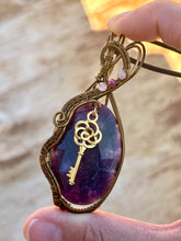 Load image into Gallery viewer, Rose cut lepidolite with peach moonstone + ruby inclusions   Wire wrapped pendant
