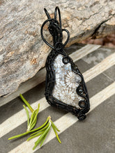 Load image into Gallery viewer, Artisan cab (positive rocks) black fossilized coral with obsidian + rutile quartz gem accents wire wrapped pendant necklace

