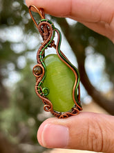 Load image into Gallery viewer, Green cat’s eye with green tourmaline gem accents wire wrapped pendant necklace
