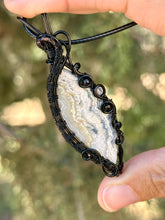 Load image into Gallery viewer, ARTISAN stone (Alisha Stolstig) White crazy lace agate with onyx + rutile quartz gem accents wire wrapped pendant necklace
