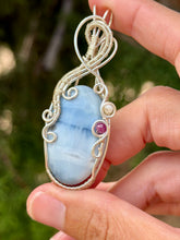 Load image into Gallery viewer, Blue owyhee opal with mother of pearl + ruby gem accents wire wrapped pendant necklace

