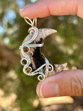 Load image into Gallery viewer, Artisan cab (positive rocks) fossilized palm root crescent moon with tiger eye + tourmaline gem accents wire wrapped pendant necklace
