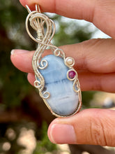 Load image into Gallery viewer, Blue owyhee opal with mother of pearl + ruby gem accents wire wrapped pendant necklace
