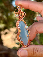 Load image into Gallery viewer, Blue onyx with  hematite + Amazonite gem accent wire wrapped pendant necklace
