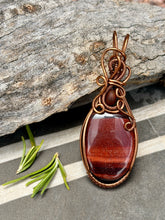 Load image into Gallery viewer, Red tiger eye with Baltic amber gem accent wire wrapped pendant necklace
