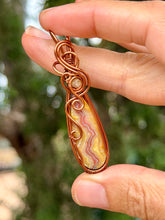 Load image into Gallery viewer, Artisan cab (casdans) yellow crazy lace agate with citrine gem accent wire wrapped pendant necklace
