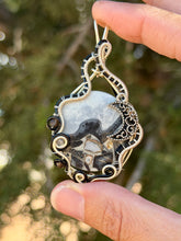 Load image into Gallery viewer, Artisan cab (positive rocks) black scenic maligano jasper with obsidian + labradorite gem accent wire wrapped pendant necklace
