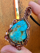 Load image into Gallery viewer, Reserved for Jennifer p Sky turquoise with Ethiopian Opal + Ruby Gem Inclusions Wire Wrapped Pendent Necklacee
