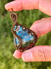 Load image into Gallery viewer, Artisan cab (positive rocks) Blue (dyed) Indonesian moss agate with pyrite + sapphire gem accents wire wrapped pendant necklace
